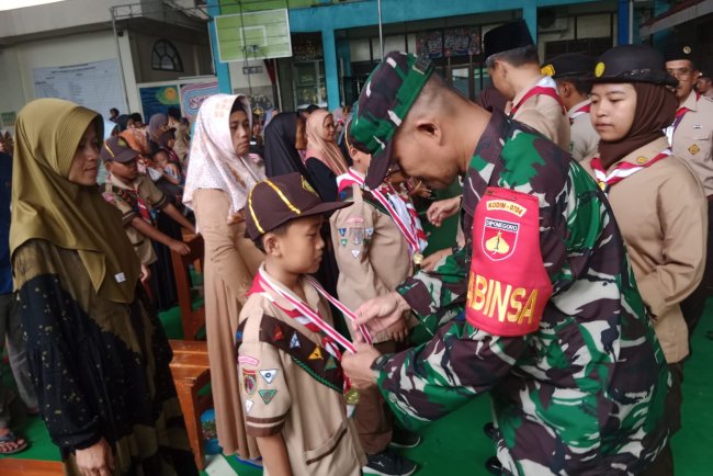Babinsa Hadiri Pelantikan  Dan Pengukuhan Pramuka Siaga dan Penggalang Garuda 