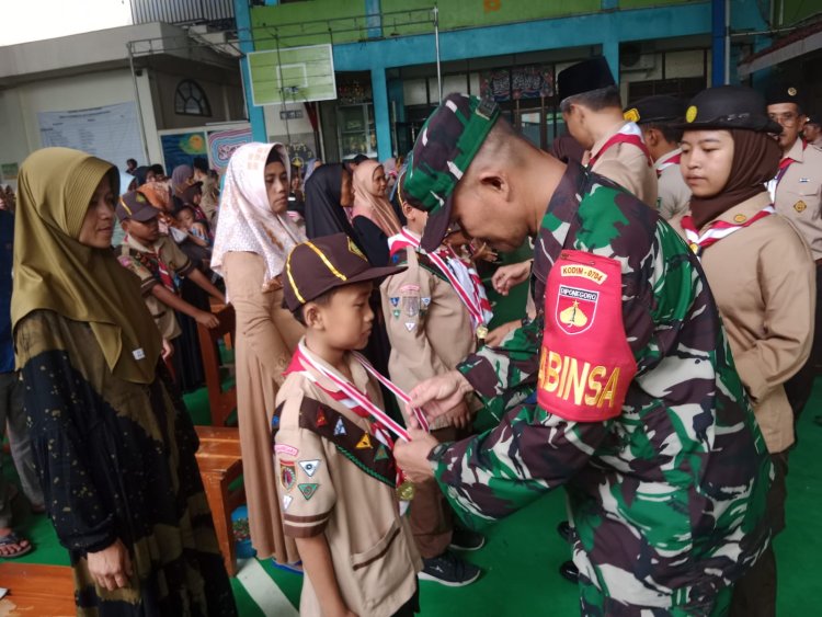 Babinsa Hadiri Pelantikan  Dan Pengukuhan Pramuka Siaga dan Penggalang Garuda 
