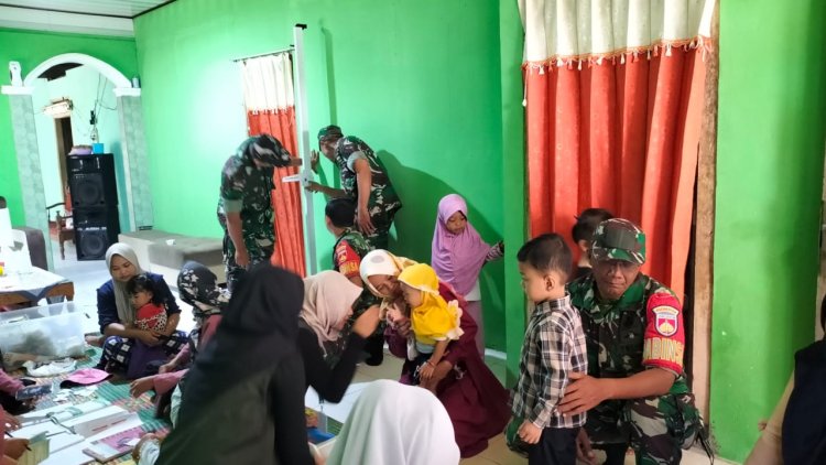 Peduli Kesehatan Babinsa Dampingi Kegiatan Imunisasi