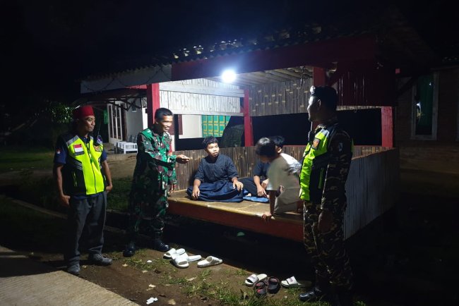 Kolaborasi Babinsa dan Banser Melakukan Patroli Bersama