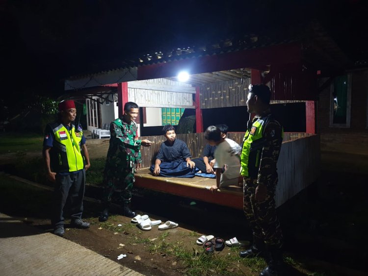 Kolaborasi Babinsa dan Banser Melakukan Patroli Bersama