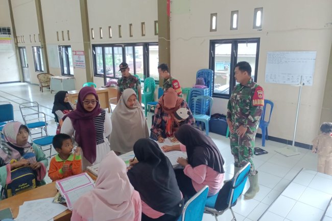 Anggota ikut bantu kader kegiatan Posyandu