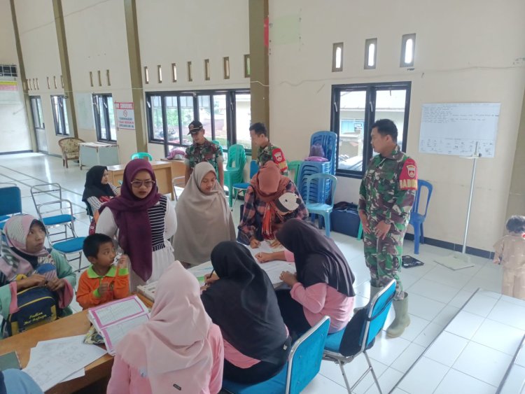 Anggota ikut bantu kader kegiatan Posyandu