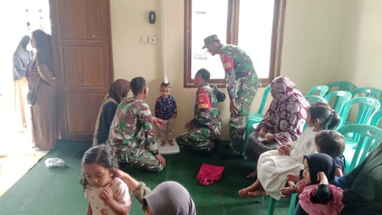 Babinsa Koramil 18 Pagentan Monitoring Posyandu Balita