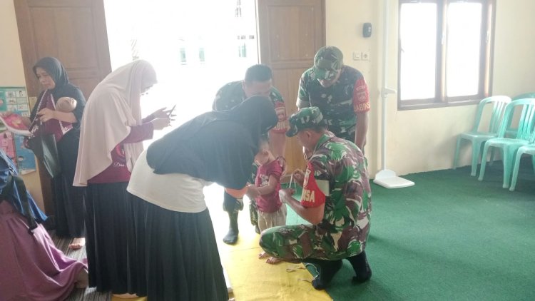 Babinsa Koramil 18 Pagentan Dampingi Kegiatan Posyandu Margo Mulyo 1, Wujud Kepedulian TNI terhadap Kesehatan Balita